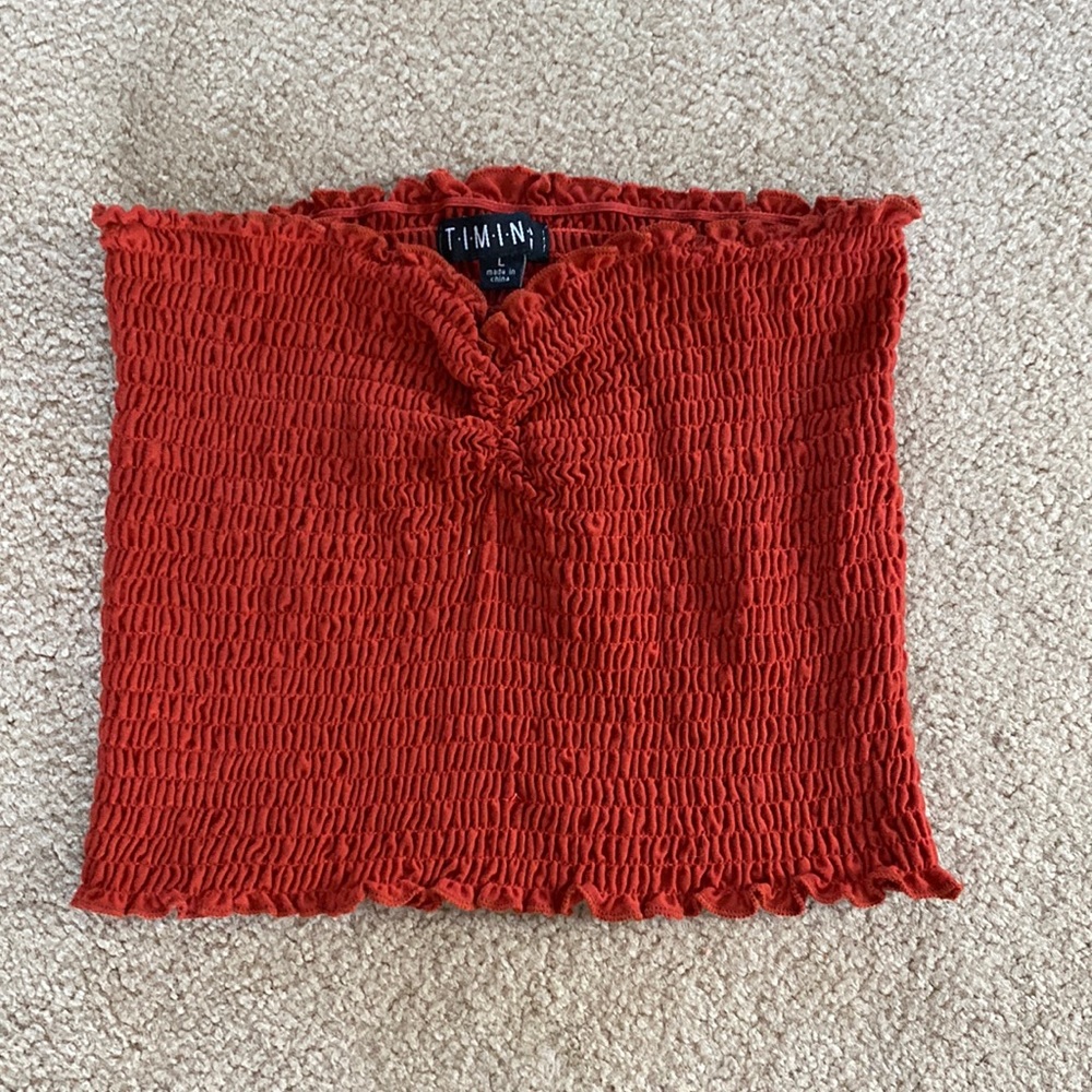 Red ruffled strapless crop top